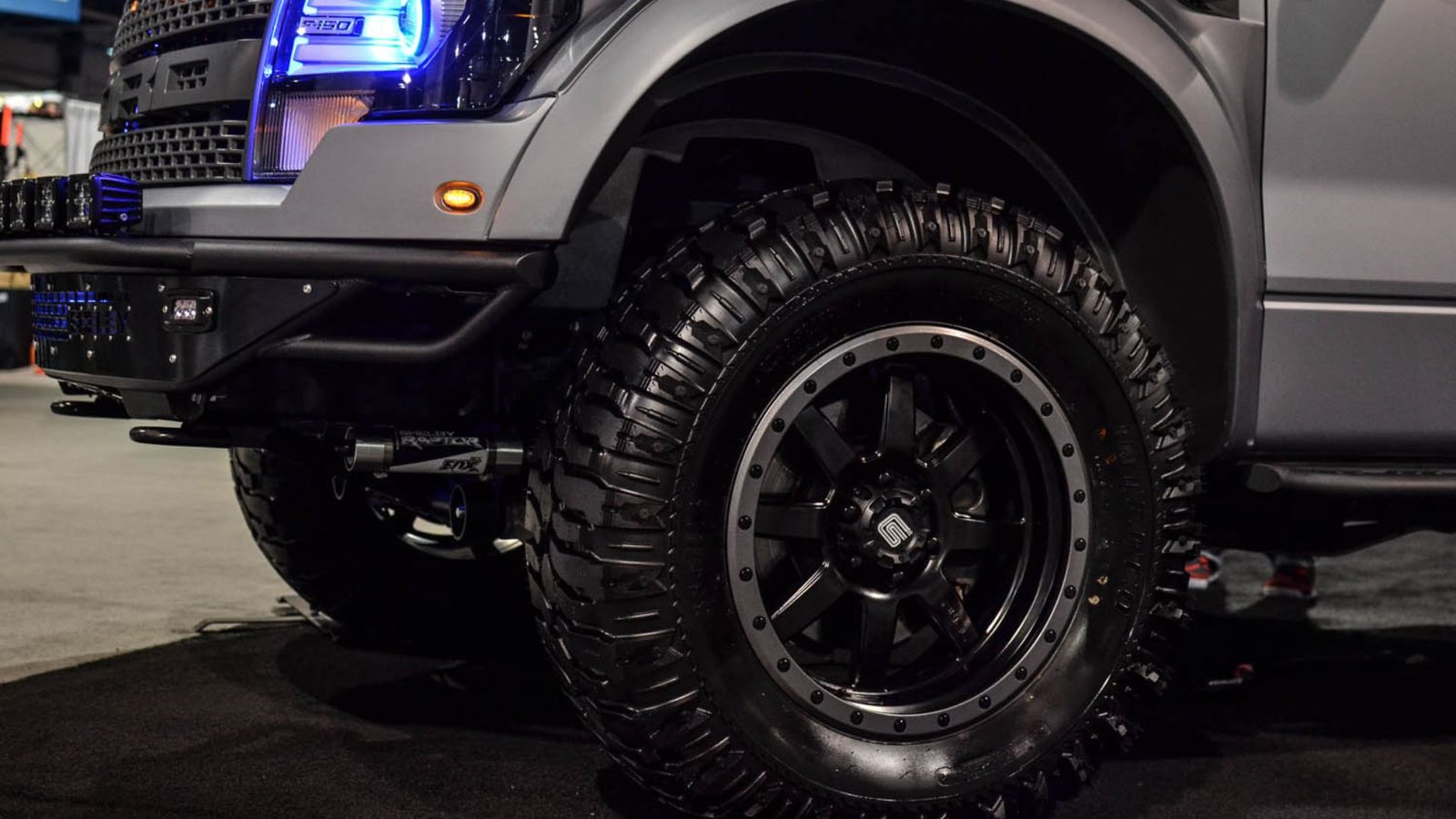 A black car showing What to Look for in Off-Road Wheels