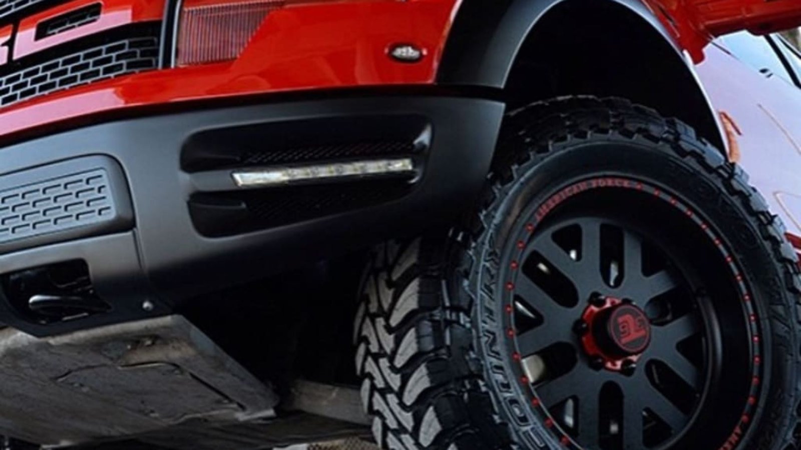 A red car showing What to Look for in Off-Road Wheels